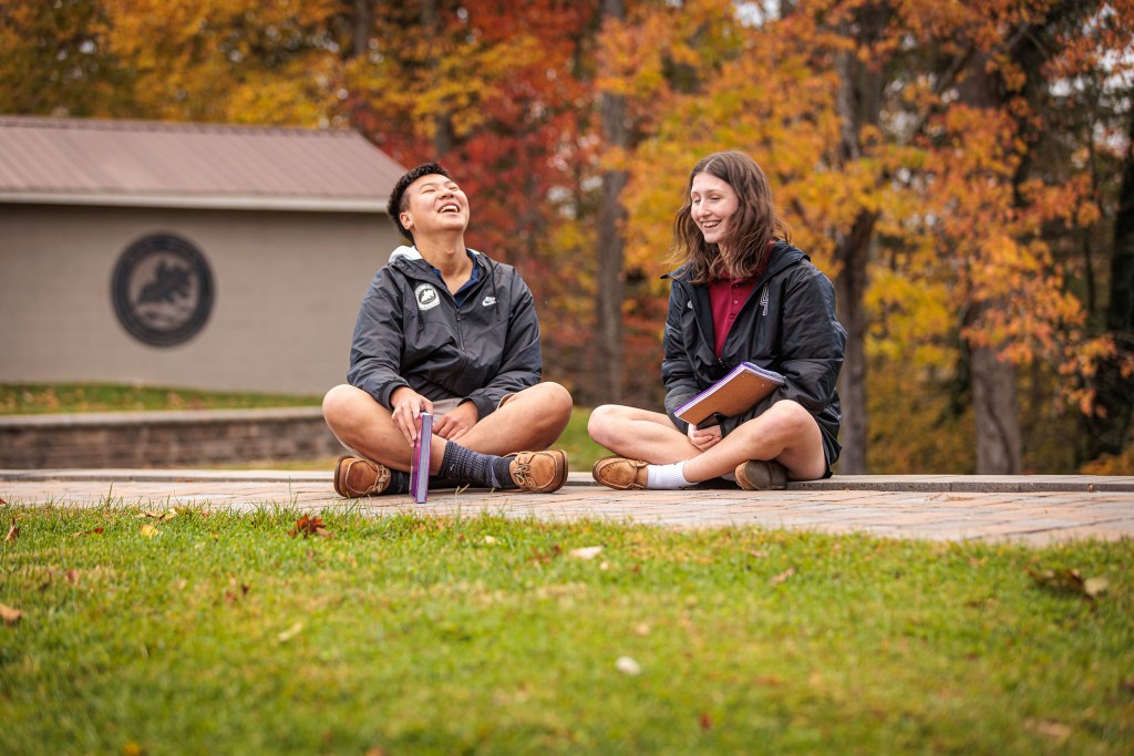 Oak Hill Academy students seated outside